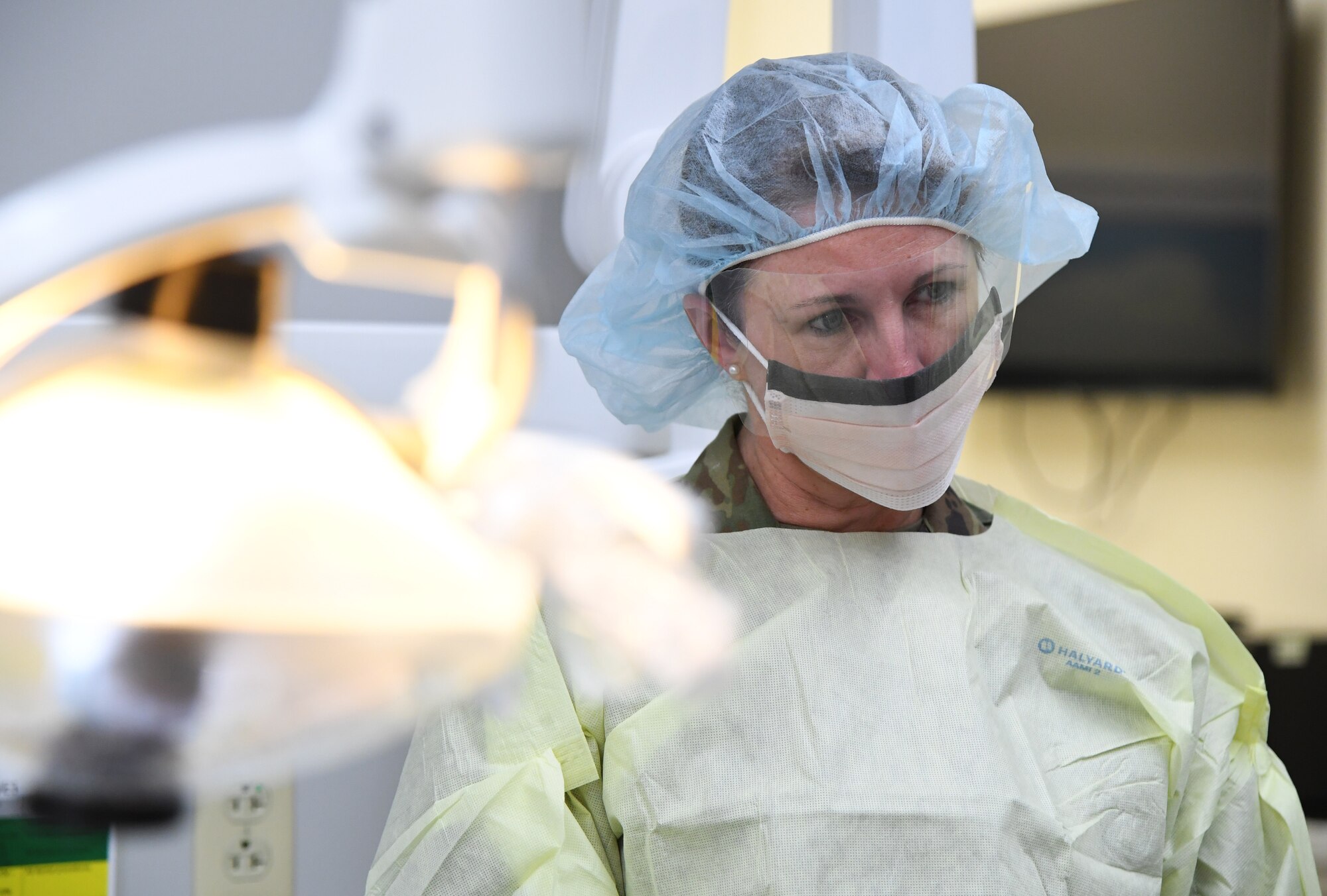 U.S. Air Force Col. Beatrice Dolihite, 81st Medical Group commander, watches a dental exam demonstration at the dental clinic inside the Keesler Medical Center at Keesler Air Force Base, Mississippi, Sept. 17, 2019. The "Dragon Medic Experience" allowed the 81st MDG leadership to work side-by-side with group medics in order to understand the challenges and barriers they may face while providing care. It also allowed them to see first-hand the great ideas that the staff has implemented to focus on the patient experience. This experience helps us cultivate an environment where senior leadership has direct engagement and connection with our front line medics who strive to deliver outstanding care. (U.S. Air Force photo by Kemberly Groue)