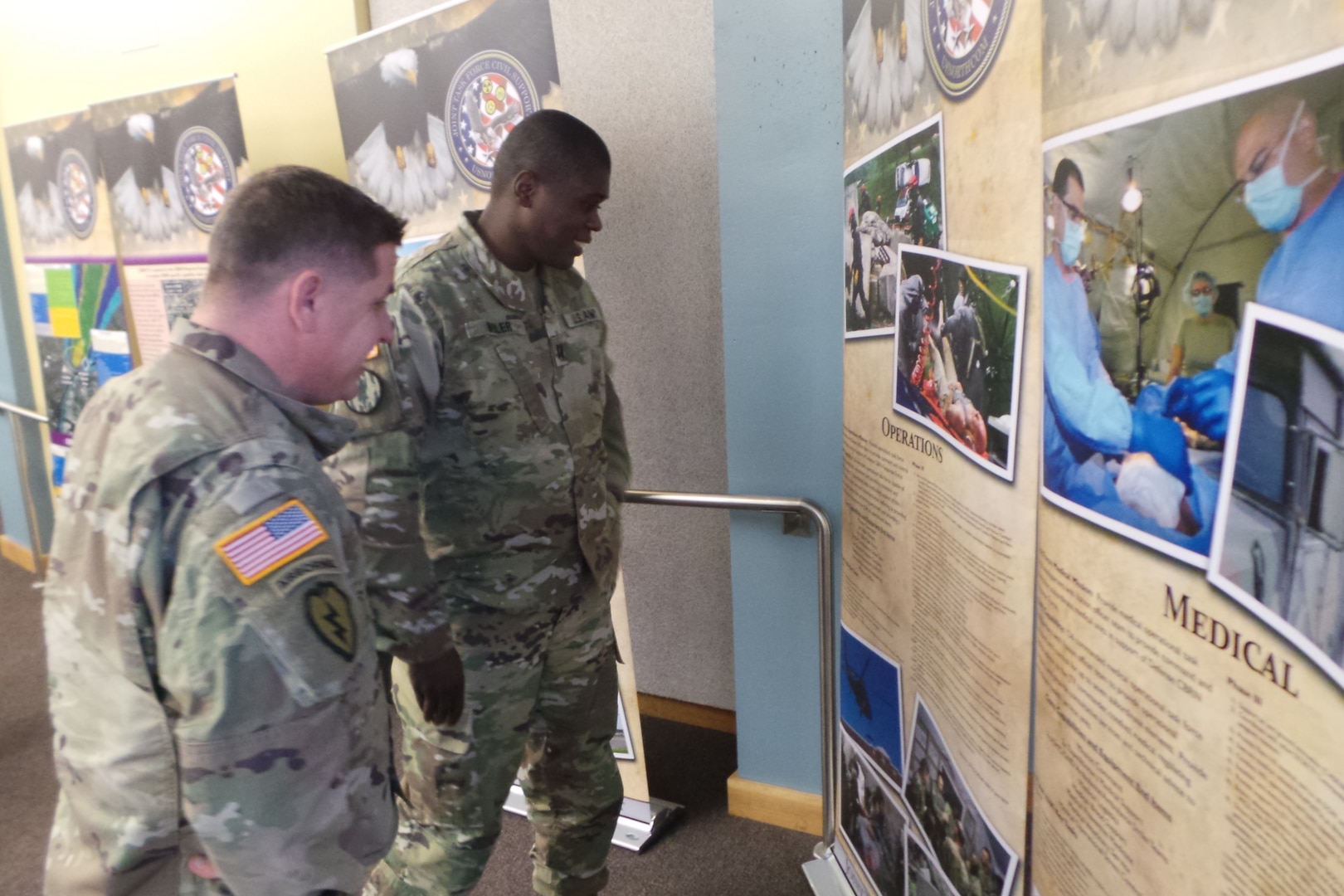 Service members attending the Mobile Training Team (MTT) at Joint Base Lewis-McChord, Wash. read an information display about Joint Task Force Civil Support (JTF-CS) and its mission. The MTT focused on the CBRN mission and DSCA. The briefings are designed to train oncoming DCRF units on specific mission requirements in the event of a CBRN response. (Official DoD photo by Mass Communication Specialist 3rd Class Michael Redd/RELEASED)