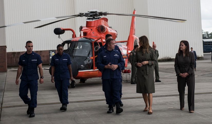 First Lady Melania Trump and Second Lady Karen Pence are briefed by members of U.S. Coast Guard Sector Charleston during a visit to Joint Base Charleston, S.C. October 30, 2019. While here, they met with Airmen, Sailors, Soldiers, Marines, Coast Guardsmen, and students from Lambs Elementary School to learn more about the community’s capabilities in disaster response, relief and recovery efforts.