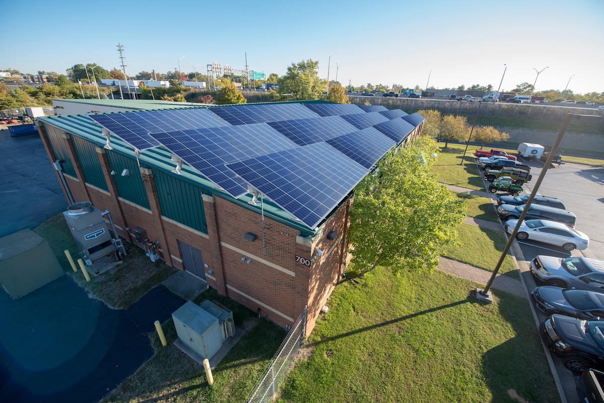 This photo illustration depicts a planned solar array for the 123rd Civil Engineer Squadron building at the Kentucky Air National Guard Base in Louisville, Ky. The array is expected to save the base approximately $18,000 a year in energy costs. (U.S. Air National Guard photo illustration by Master Sgt. Phil Speck)