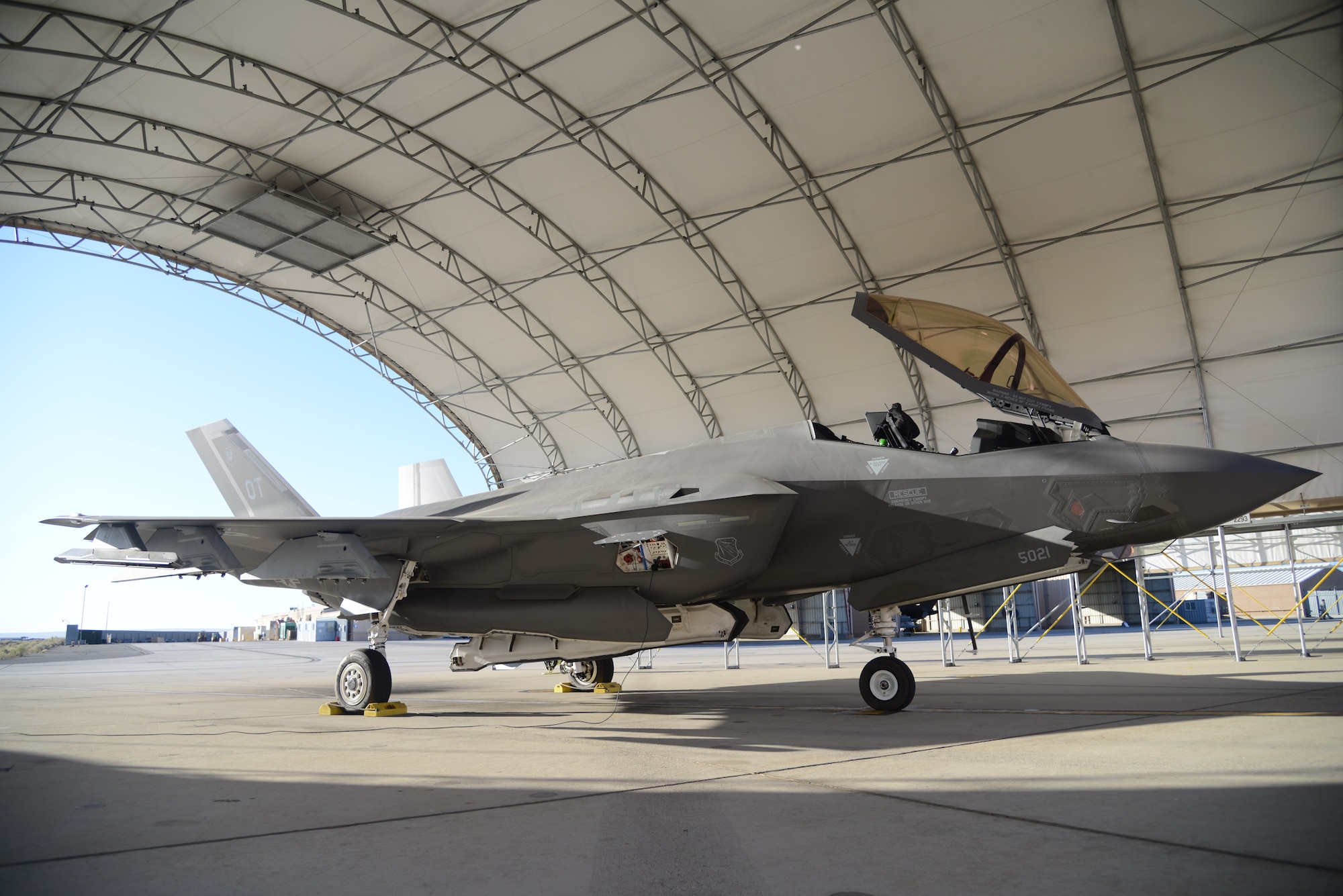 An F-35 Lightning II is parked prior to its final flight out of Edwards Air Force Base, California, Oct. 7. Six F-35s recently left Edwards and were reassigned to the 422nd Test and Evaluation Squadron at Nellis Air Force Base, Nevada. (U.S. Air Force photo by Giancarlo Casem)