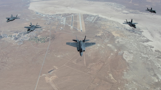 A formation flight of F-35 Lightning IIs over Edwards Air Force Base, California. The 31st Test and Evaluation Squadron recently completed its initial operational test and evaluation mission and six F-35s were reassigned to the 422nd Test and Evaluation Squadron at Nellis Air Force Base, Nevada. Included in the formation are two F-35As, two F-35Bs, and one F-35C. (Photo courtesy of Darin Russell, Lockheed Martin)