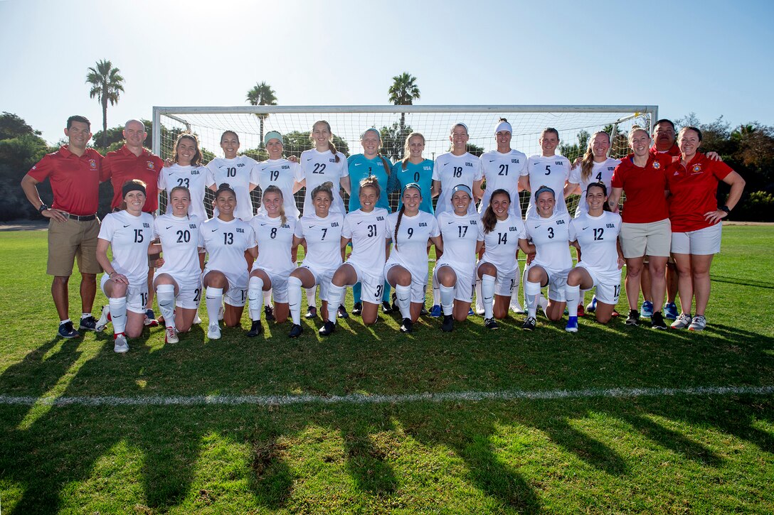 2nd Lt. Morgan Mavroudis, 412th Security Forces Squadron, wearing number 18, poses for a photo with the U.S. Women’s Armed Forces Soccer Team in San Diego, California, Oct. 10. (Photo courtesy of EJ Hersom, US Armed Forces Sports)