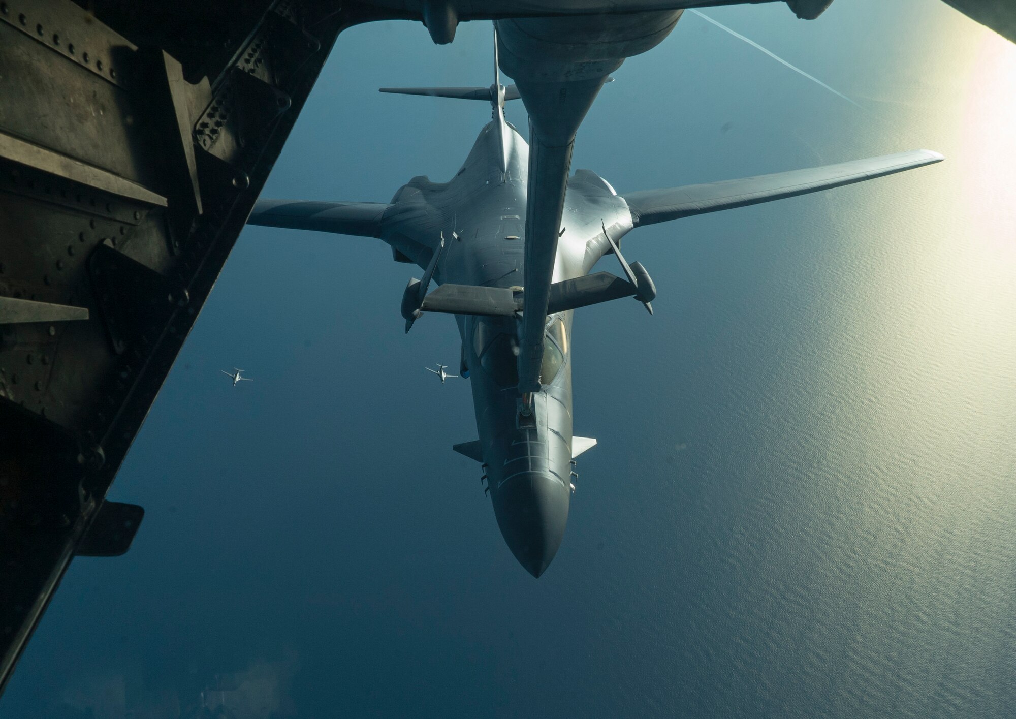 B-1B Lancers receive fuel from a KC-10 Extender