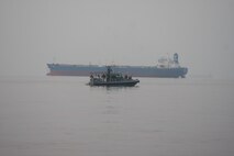 STRAIGHT OF HORMUZ (Oct 24, 2019) Marines assigned to Fleet Anti-Terrorism Security Team, Central Command (FASTCENT), approach the Arc Liberty, a Military Sealift Command time chartered vessel, in the Arabian Gulf to provide embarked security during a Strait of Hormuz transit. FASTCENT Marines work with U.S. partners and allies to protect personnel and property while simultaneously ensuring freedom of navigation in international waterways. Task Force 51 and 5th Marine Expeditionary Brigade is entrusted with rapidly aggregating crisis response capabilities and positioning Navy and Marine Corps forces throughout the U.S. Central Command area of responsibility to ensure command and control of forces at sea, from the sea, and ashore. (Photo by Marine Corps Cpl. Tanner A. Gerst)