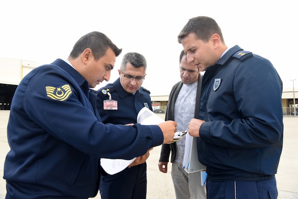 Turkish air force members collect data during Paver training Oct. 22, 2019, at Incirlik Air Base, Turkey. Paver is a software tool allowing engineers the opportunity to collect data on the airfield and streamline pavement maintenance. (U.S. Air Force photo by Tech. Sgt. Jim Araos)
