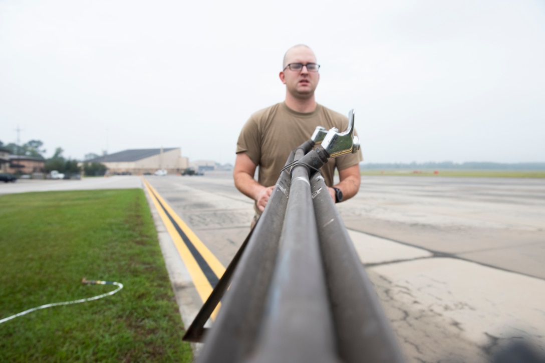 Staff Sgt. Douglas Shaw, 23d Civil Engineer Squadron (CES) water and fuel systems maintenance journeyman, transports water fountains Oct. 29, 2019, at Moody Air Force Base, Ga. The 23d CES installed water fountains around the flightline in preparation for the air show. This will give air show attendees locations for clean water and help with dehydration related injuries. (U.S. Air Force photo by Airman Elijah Dority)