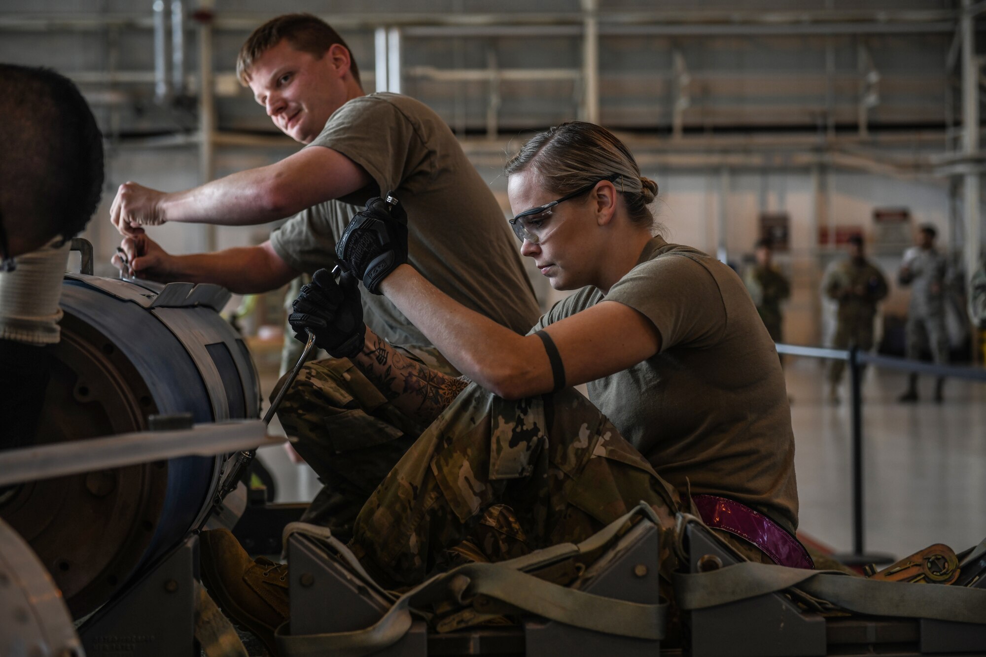 U.S Airmen from the 31st Munition Squadron conduct an inert bomb build at Aviano Air Base, Italy, Oct. 31, 2019. The Rapid Aircraft Generation and Employment competition is the first of its kind and will be held quarterly at Aviano AB. (U.S. Air Force photo by Airman 1st Class Ericka A. Woolever).