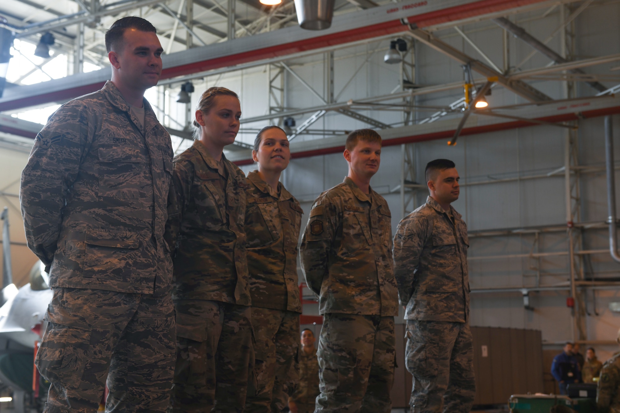 U.S Airmen from the 31st Munition Squadron stand on a trailer at Aviano Air Base, Italy, Oct. 31, 2019. The Rapid Aircraft Generation and Employment competition consisted of one seven-level Ammo, two Ammo five-levels, and two Ammo-three levels crew chiefs. (U.S. Air Force photo by Airman 1st Class Ericka A. Woolever).