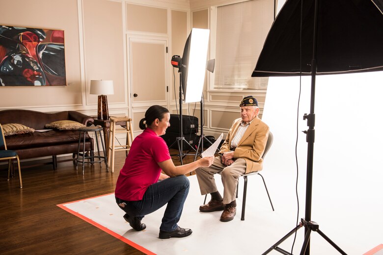 Stacy Pearsall at photo session with a veteran at the Hickory Museum of Art.