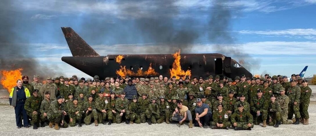 Competitors with the US Army Reserve and Canadian Armed Forces pose for a group photo at the St Luke’s Field Ambulance Validation Event, hosted by the Canadian Armed Forces, 25 Field Ambulance, in Toronto, Ontario, Oct. 26th.