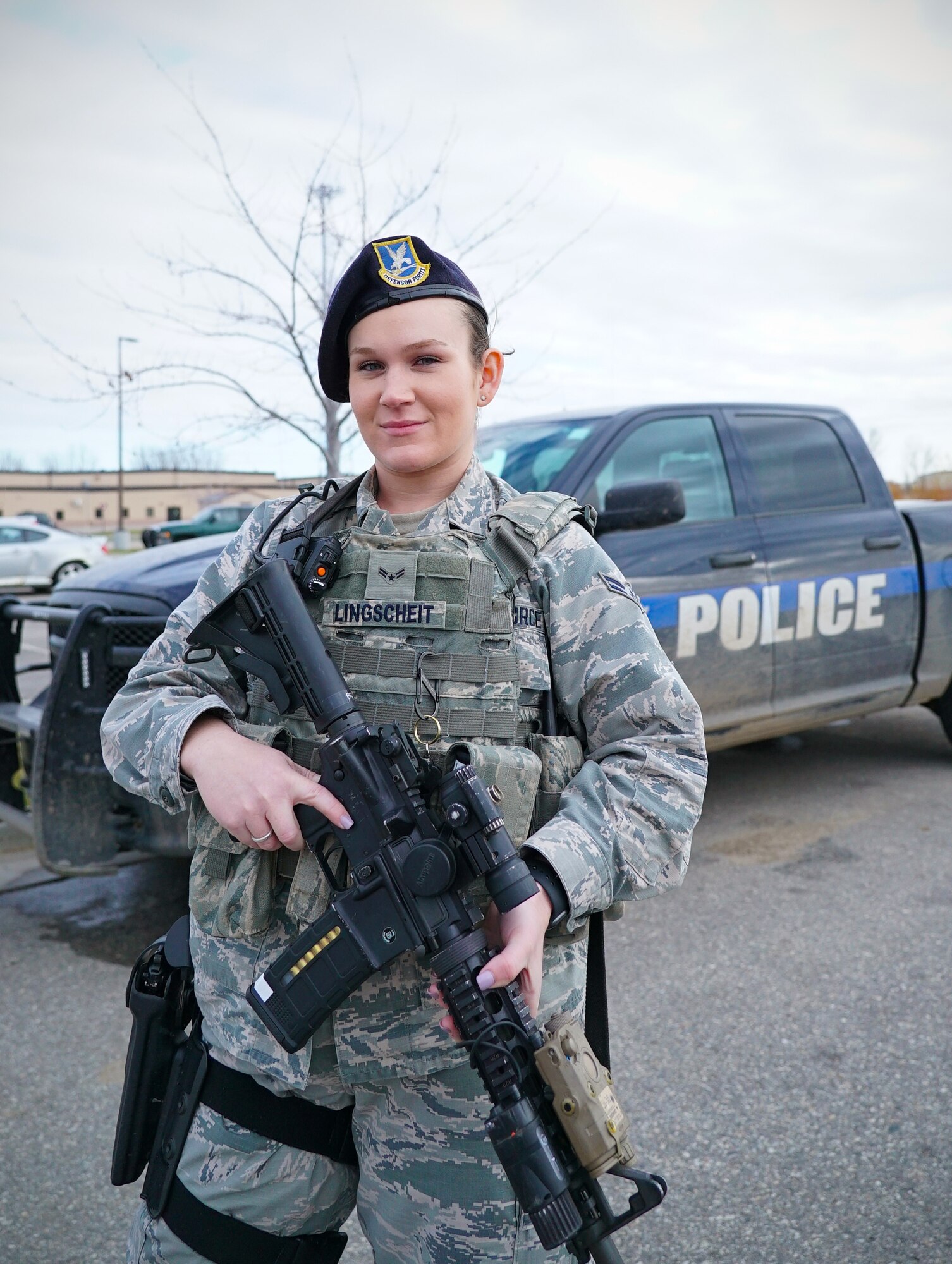 Airman 1st Class Taylor Lingscheit, 319th Security Forces Squadron installation entry controller, poses for a photo on National First Responders Day, Oct. 28, 2019, on Grand Forks Air Force Base, North Dakota. Lingscheit said she feels rewarded, knowing her line of duty puts her in a position to defend the base. (U.S. Air Force photo by Senior Airman Elora J. Martinez)