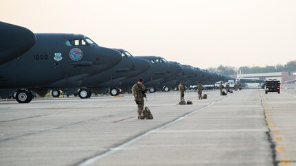 Airmen assigned to the 2nd Security Forces Squadron stand guard in front of B-52H Stratofortress aircraft in support of Global Thunder 20 at Barksdale Air Force Base, La., Oct. 22, 2019. Global Thunder is an exercise that focuses on U.S. Strategic Command and component forces' ability to support the geographic combatant commands, deter adversaries and, if necessary, employ forces as directed by the President of the United States. (U.S. Air Force photo by Senior Airman Tessa B. Corrick)