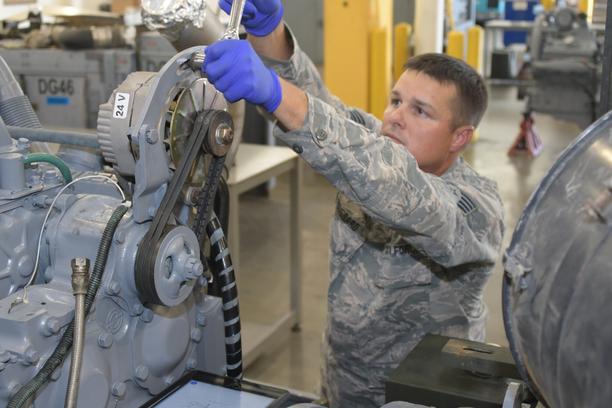 U.S. Air Force Staff Sgt. Justin Broussard, 116th Maintenance Group, 116th Air Control Wing, Georgia Air National Guard, works on aerospace ground equipment at Robins Air Force Base, Georgia, Oct. 1, 2019. Broussard will be representing Team USA in golf at the 7th CISM World Games in Wuhan, China. U.S. Air National Guard photo by Barry Bena.