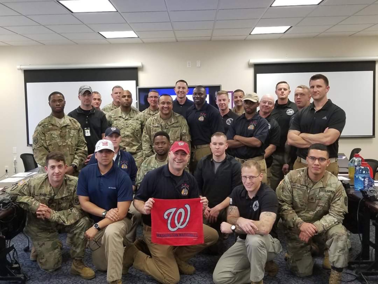 Members of the District of Columbia National Guard’s 33rd Civil Support Team take time to celebrate the National’s victory over the Houston Astros. In addition to supporting the Marine Corps Marathon, the 33rd CST provided District officials support during the historic 2019 Major League Baseball World Series games at the National’s Stadium Oct. 25-27.