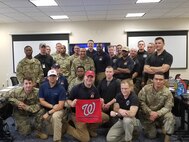 Members of the District of Columbia National Guard’s 33rd Civil Support Team take time to celebrate the National’s victory over the Houston Astros. In addition to supporting the Marine Corps Marathon, the 33rd CST provided District officials support during the historic 2019 Major League Baseball World Series games at the National’s Stadium Oct. 25-27.