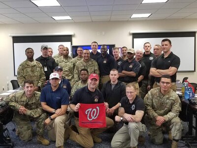 Members of the District of Columbia National Guard’s 33rd Civil Support Team take time to celebrate the National’s victory over the Houston Astros. In addition to supporting the Marine Corps Marathon, the 33rd CST provided District officials support during the historic 2019 Major League Baseball World Series games at the National’s Stadium Oct. 25-27.