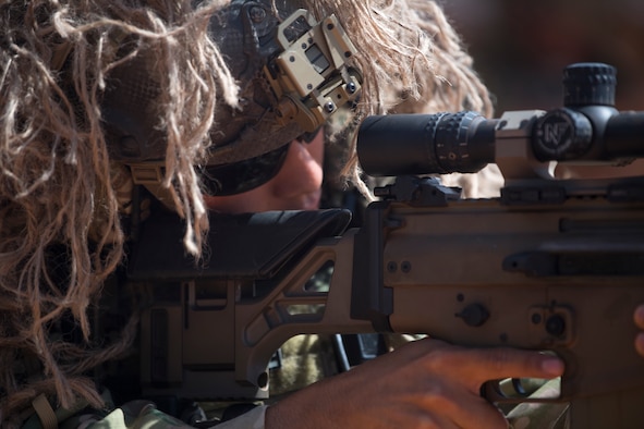 A U.S. Air Force Special Tactics operator fires his weapon during long-range weapons training near Hurlburt Field, Florida, Sept. 20, 2019. The training was part of the first-ever Special Reconnaissance training course. The Special Tactics Training Squadron conducted the course to identify specific core tasks required for each skill level of the new SR career field. Special Tactics is a special operations ground force comprised of highly trained Airmen who solve air to ground problems across the spectrum of conflict and crisis. (U.S. Air Force photo by Master Sgt. Jason Robertson)