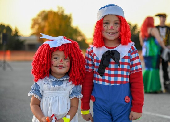 Callie Hancox, age 3, and Cayson Hancox, age 5, pose for a photo at the Trunk or Treat Spooktacular event Oct. 25, 2019, at McConnell Air Force base, Kan. Trunk or Treat is an annual wing event hosted by the McConnell Community Center. The event provided a safe and fun avenue for Airman and civilian employees to take take their children trick or treating.  (U.S. Air Force photo by Airman 1st Class Nilsa E. Garcia)
