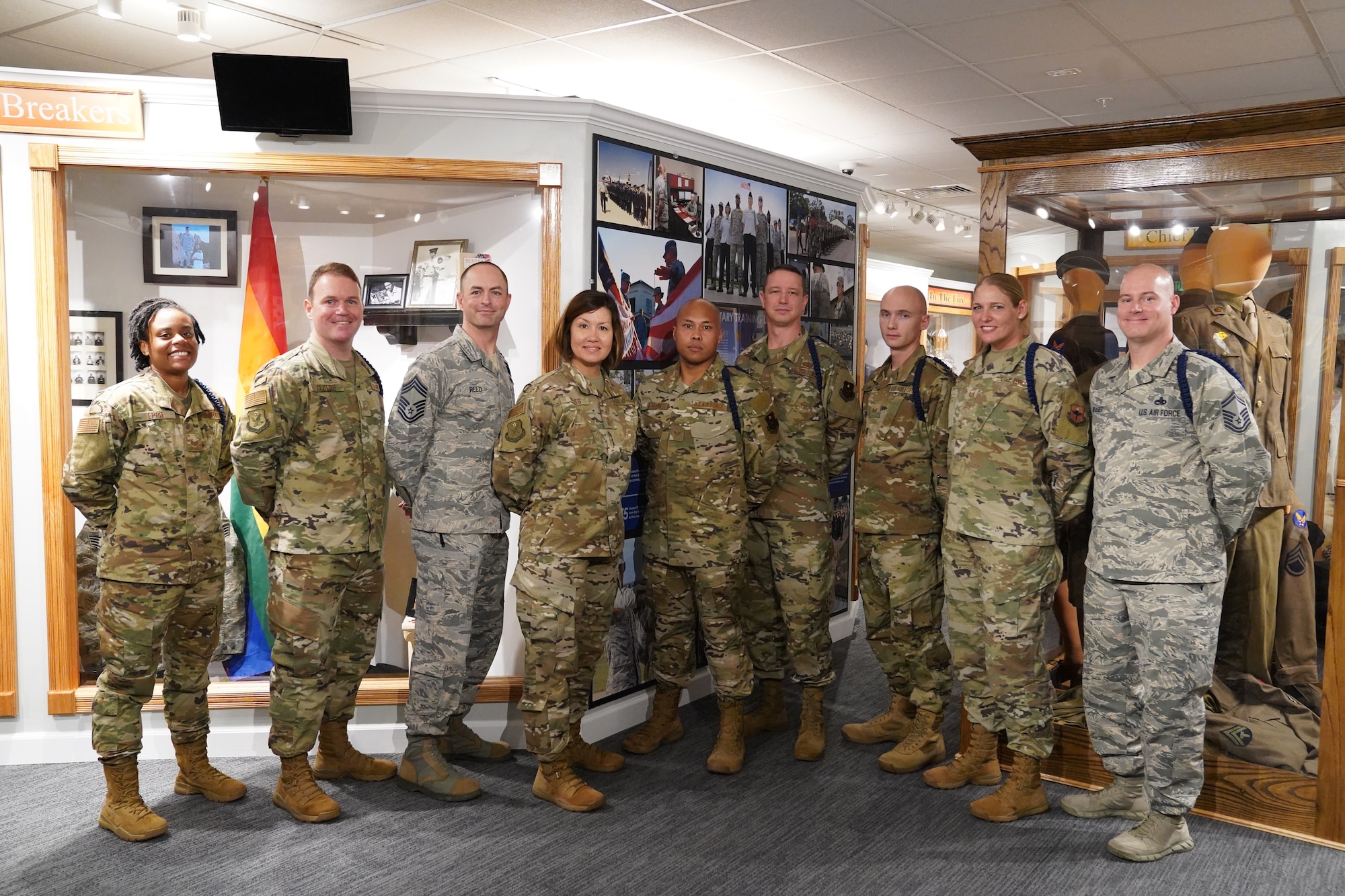 Second Air Force leadership and military training leaders pose for a photo in front of the MTL wall at the Air Force Enlisted Heritage Hall at Maxwell Air Force Base Gunter Annex, Alabama, Oct. 30, 2019. MTLs play a vital role in the development of the next generation of Air Force leaders, warfighters, and protectors of freedom. The Air Force Enlisted Heritage Hall has dedicated a wall to highlight their lineage and contributions to the Air Force. (U.S Air Force photo by Airman 1st Class Spencer Tobler)