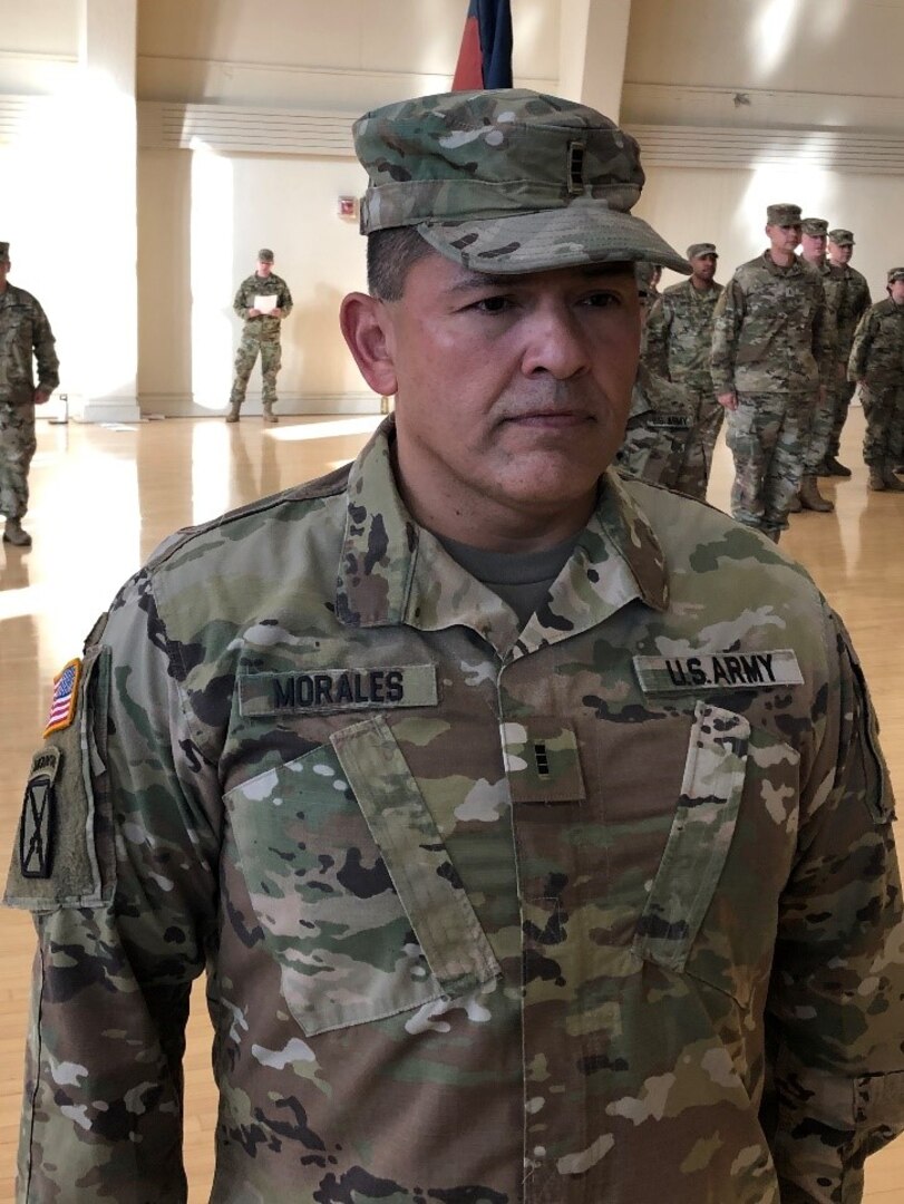 Chief Warrant Officer-3 Juan Morales of Joliet, Illinois, stands at the position of attention during his promotion ceremony at the Urbana Readiness Center in Urbana Oct. 18.