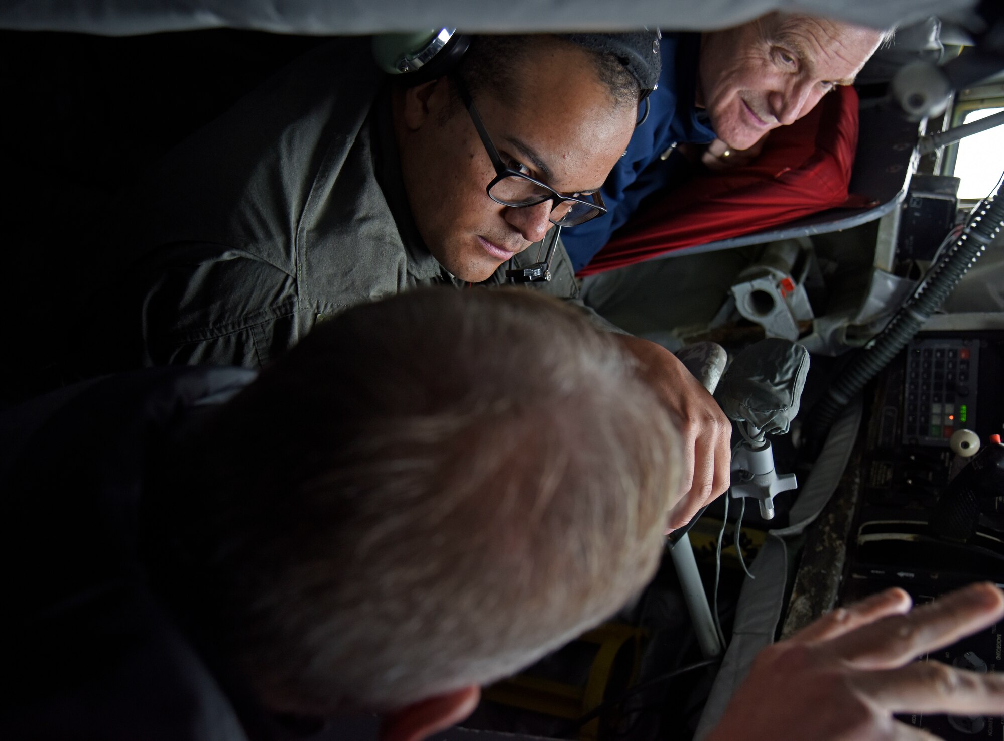U.S. Air Force Staff Sgt. Joseph Fromm, 92nd Air Refueling Squadron boom operator, demonstrates in-flight refueling controls to Fairchild Air Force Base honorary commanders during a civic leader tour to Scott Air Force Base, Illinois, Oct. 17. The tour is designed to increase civic leaders’ understanding of Air Mobility Command, United States Transportation Command, 618th Air Operations Command and how the community can impact Airmen’s quality of life. (U.S. Air Force photo by Senior Airman Jesenia Landaverde)