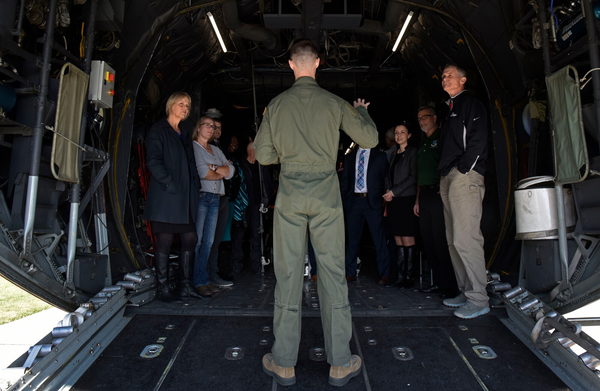 U.S. Air Force Staff Sgt. Brannon Tulloss, 375th Aeromedical Evacuation Squadron technician, briefs Spokane-area civic leaders on the roles and responsibilities of in-flight medical care during a civic leader tour to Scott Air Force Base, Illinois, Oct. 17. The squadron plays a key role in providing critical patient care for service members assigned to bases with limited medical resources. (U.S. Air Force photo by Senior Airman Jesenia Landaverde)
