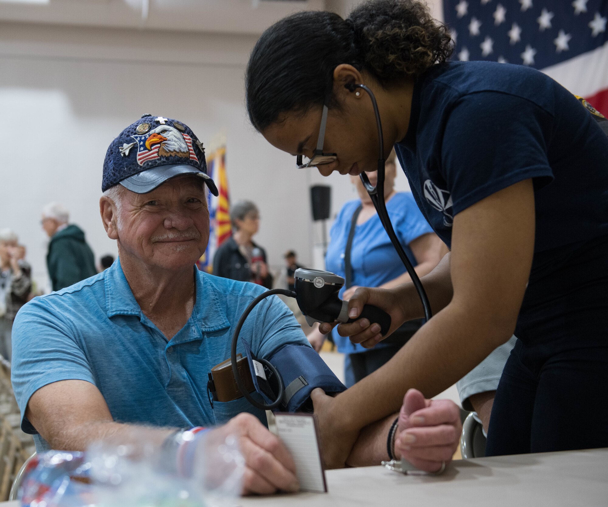 Airman 1st Class Sarah Amato, 56th Operational Medical Readiness Squadron operational medical technician, measures a retiree’s blood pressure during a Retiree Appreciation Day (RAD) event Oct. 26, 2019, at the Navy Operational Support Center in Luke Air Force Base, Ariz.