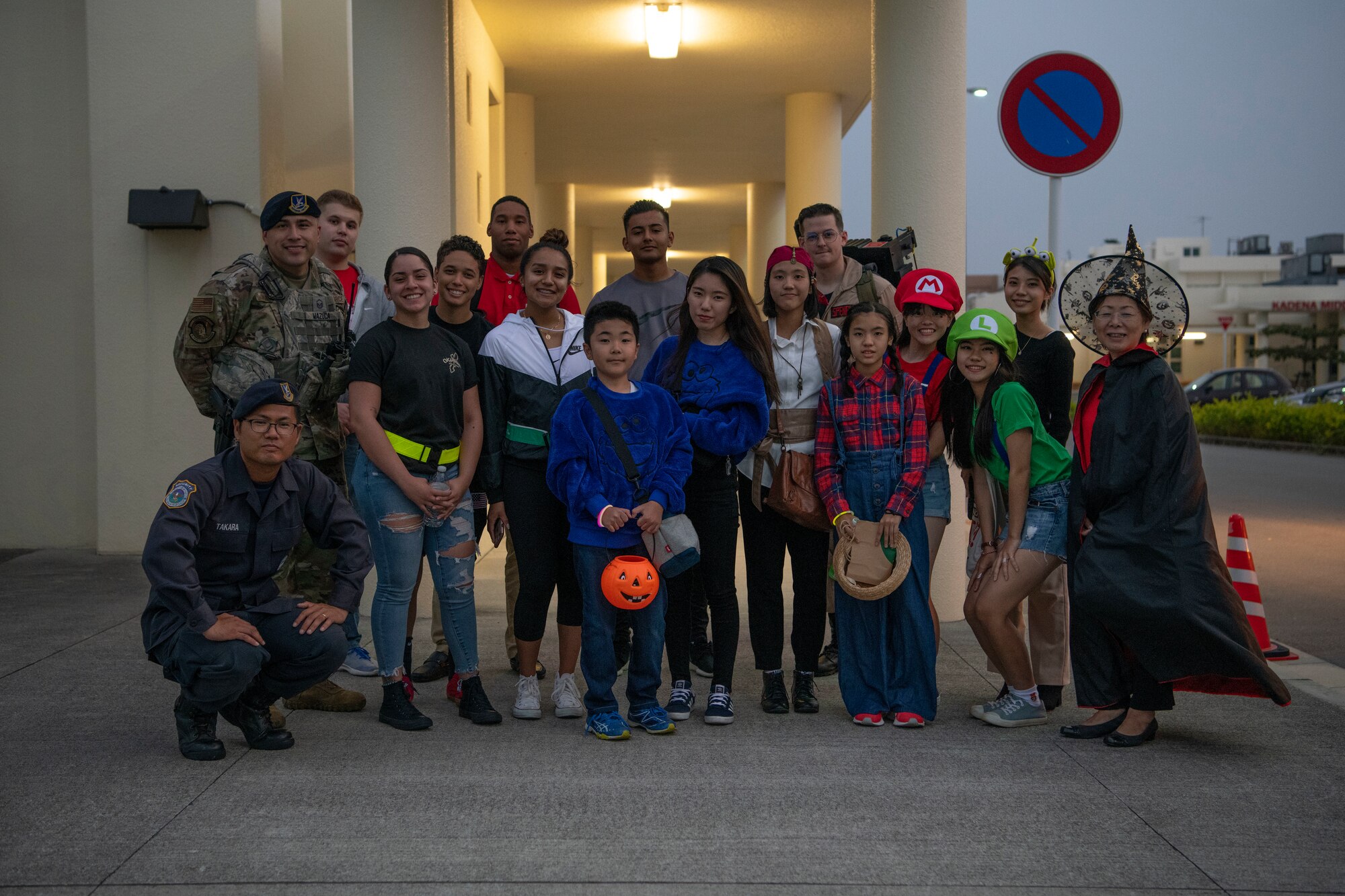 Okinawan children kick-off their Halloween trick-or-treating Oct. 31, 2019, on Kadena Air Base, Japan. The base opened its gates to a portion of the local community to share the traditional custom of trick-or-treating to enhance relations with host nation partners. (U.S. Air Force photo by Senior Airman Rhett Isbell)