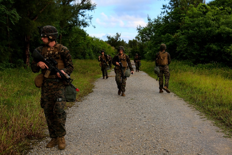 U.S. Marines with Headquarters Battalion, 3rd Marine Division, conduct a patrol during Samurai 20-1 on Camp Hansen, Okinawa, Japan, Oct. 22, 2019. The purpose of this exercise is to conduct battle drills that validate the 3rd Marine Division’s movement, setup of a combat operations center, force protection, and passage of command and control between supporting elements. (U.S. Marine Corps photo by Sgt. David Staten)