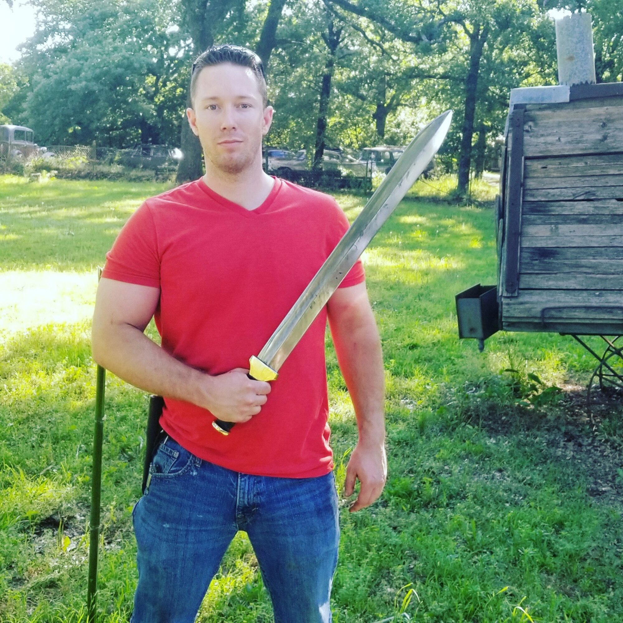 Master Sgt. Casey Cleveland, 507th Aircraft Maintenance Squadron maintenance supervisor, shows off the blade he made on the bladesmithing competition show Forged in Fire Oct. 22, 2019, at Tinker Air Force Base, Oklahoma. (U.S. Air Force photo by Senior Airman Mary Begy)