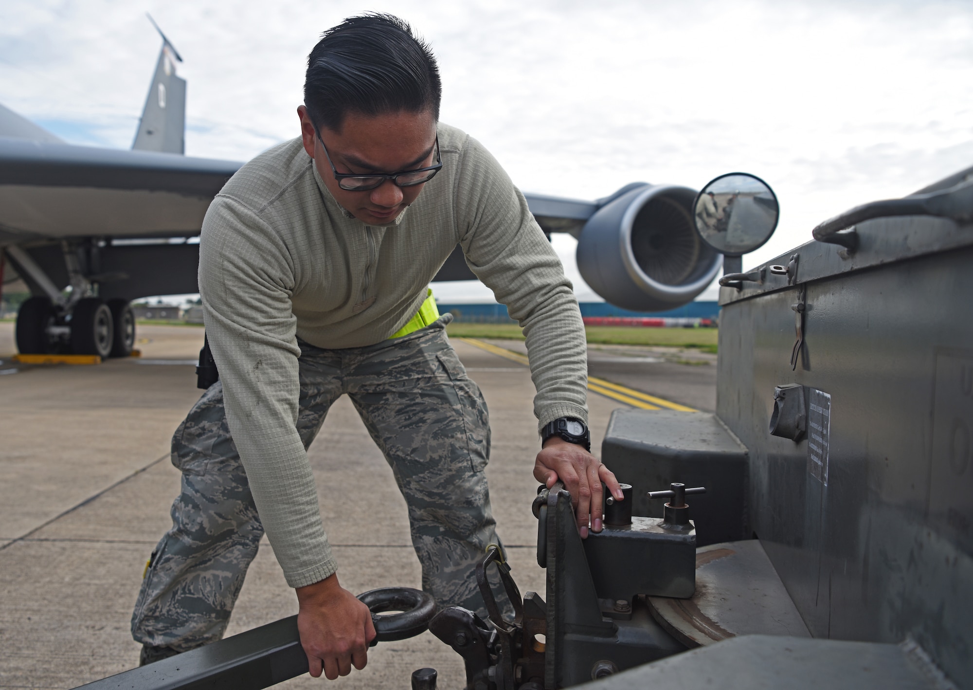 Airman 1st Class Marcus Macalinao, 100th Maintenance Squadron aerospace ground equipment technician, detaches a ground power unit at RAF Mildenhall, England, Oct. 23, 2019. AGE technicians support the Air Force mission with their expertise of maintaining, fixing and troubleshooting flightline equipment at Air Force bases worldwide. (U.S. Air Force photo by Senior Airman Brandon Esau)