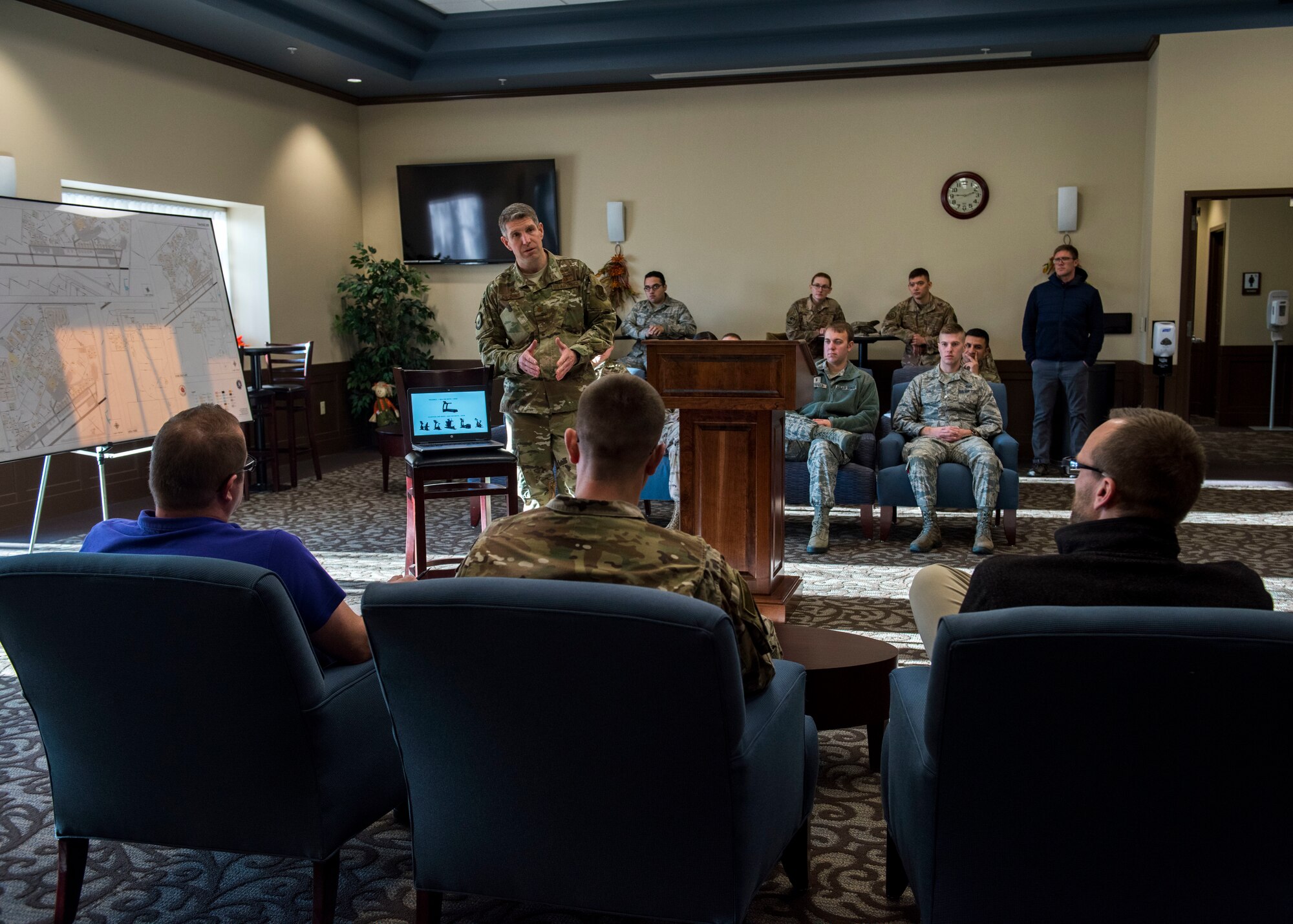 U.S. Air Force Maj. Charles Parsons, 141st Communication Squadron flight commander, pitches his idea to judges at the Energy Spark Tank forum held by the 92nd Civil Engineer Squadron at Fairchild Air Force Base, Washington, Oct. 29, 2019. Airmen from units across Fairchild participated in the forum, where they each pitched innovative ideas to a panel that consisted of 92nd CES leadership, energy management and environmental office representatives who play a critical role in implementing energy conservation actions. (U.S. Air Force photo by Airman 1st Class Lawrence Sena)