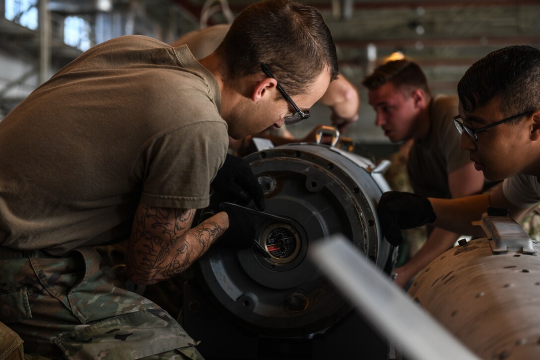 U.S Airmen from the 31st Munition Squadron conduct an inert bomb build at Aviano Air Base, Italy, Oct. 31, 2019. The Rapid Aircraft Generation and Employment competition highlighted several adaptive basing procedures. (U.S. Air Force photo by Airman 1st Class Ericka A. Woolever).