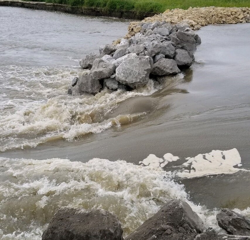 Image of final length of the north breach on Levee L550 near Watson, Missouri moments before closing, Aug. 24, 2019.