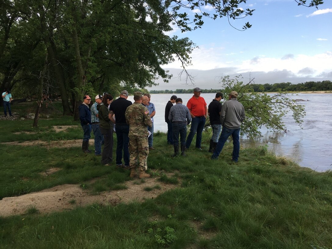 USACE contractors inspect the riverbank of the levee system during the pre-bid site visit conducted at Western Sarpy Aug. 28, 2019.