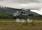 An Alaska Air National Guard HH-60 Pave Hawk, from the 210th Rescue Squadron, performs a simulated search and rescue pattern in Alaska. The 210th Rescue Squadron is part of a network of search-and-rescue organizations that save hundreds of lives in and around Alaska every year.