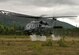 An Alaska Air National Guard HH-60 Pave Hawk, from the 210th Rescue Squadron, performs a simulated search and rescue pattern in Alaska. The 210th Rescue Squadron is part of a network of search-and-rescue organizations that save hundreds of lives in and around Alaska every year.