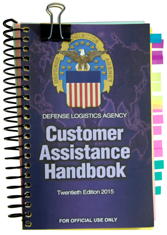 An image of the DLA Customer Assistance Handbook with multiple colored side tabs and a large paperclip on the top edge.