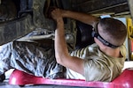 Man working on vehicle