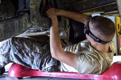 Man working on vehicle