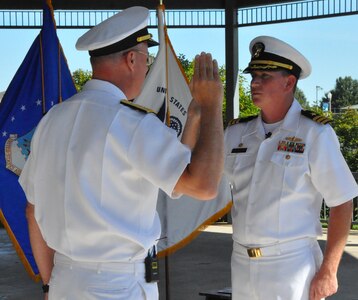 IMAGE: DAHLGREN, Va. (Aug. 30, 2019) – Rear Adm. Eric Ver Hage, Naval Sea Systems Command Warfare Centers commander, left, promotes Cmdr. Casey Plew to the rank of captain before family, friends, and colleagues at Naval Surface Warfare Center Dahlgren Division (NSWCDD). It was Plew’s second ceremony marking a career milestone in four months. The new Navy captain took command of NSWCDD – the Naval Sea System Command’s largest Naval Warfare Center – at a ceremony held on the Potomac River Test Range in April.