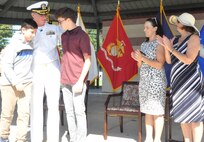 IMAGE: DAHLGREN, Va. (Aug. 30, 2019) – Family members congratulate Capt. Casey Plew during his promotion ceremony at Naval Surface Warfare Center Dahlgren Division (NSWCDD). It was Plew’s second ceremony marking a career milestone in four months. The new Navy captain took command of NSWCDD – the Naval Sea System Command’s largest Naval Warfare Center – at a ceremony held on the Potomac River Test Range in April.
