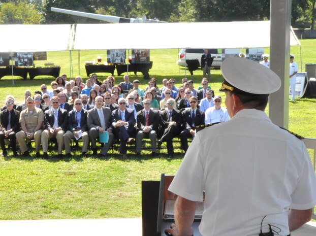 IMAGE: DAHLGREN, Va. (Aug. 30, 2019) – Capt. Casey Plew, Naval Surface Warfare Center Dahlgren Division (NSWCDD) commanding officer, speaks to family, friends, and colleagues moments after he was promoted to the rank of Navy captain on the parade field outside NSWCDD headquarters.