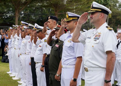 SATTAHIP, Thailand (Sept. 2, 2019) - U.S. Navy Sailors and maritime forces of ASEAN member states salute while standing in formation together during the opening ceremony for the ASEAN-U.S. Maritime Exercise (AUMX) at Sattahip Naval Base.