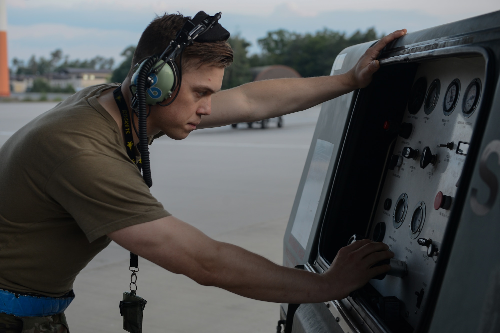 U.S. Air Force Staff Sgt. Joshua Pravel, 86th Maintenance Squadron aerospace maintenance craftsman, reads a pressure gauge at Ramstein Air Base, Germany, Aug. 29, 2019.
