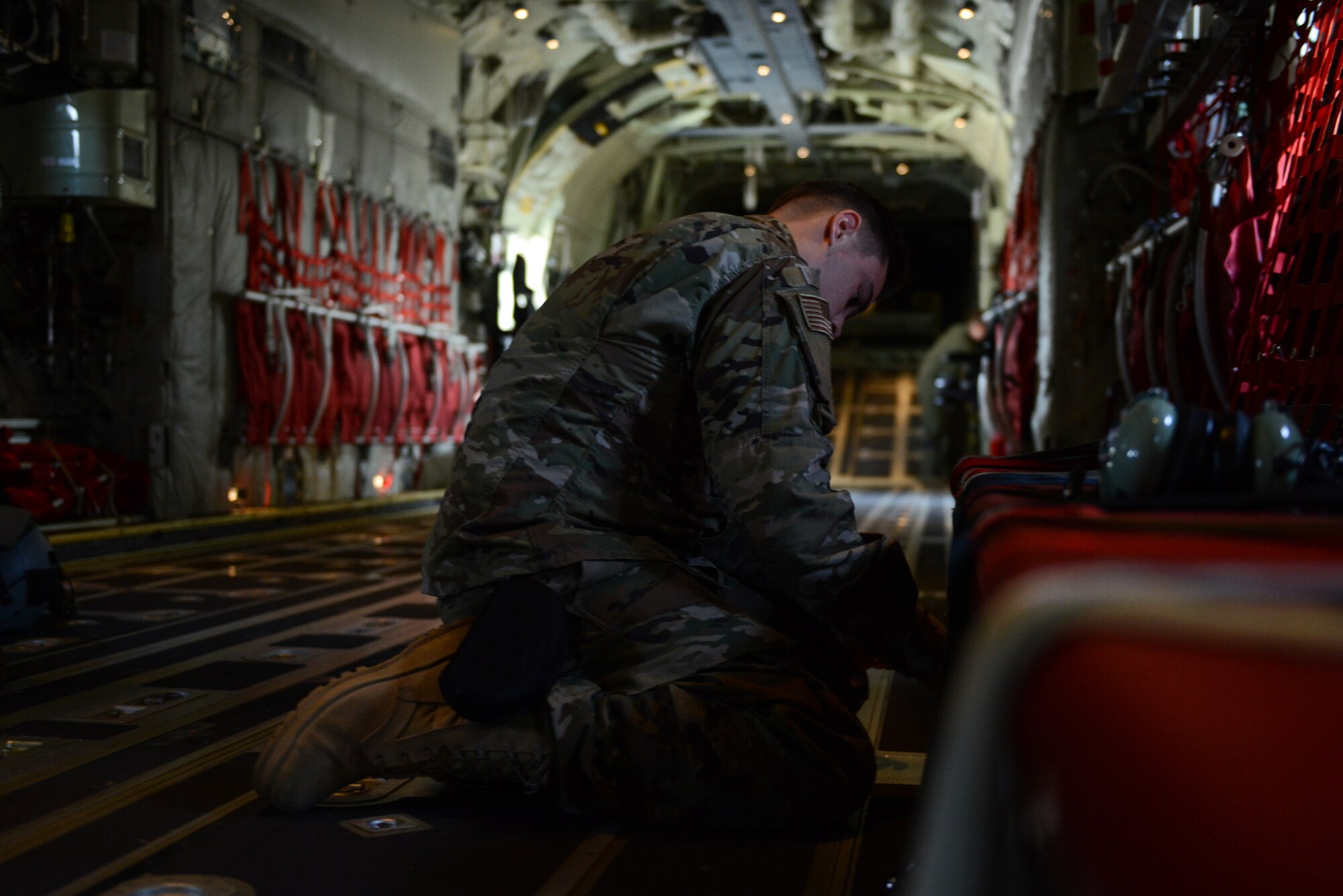 U.S. Air Force Airman Jaden Thompson, 86th Maintenance Squadron aerospace maintenance apprentice, secures seats in the back of aircraft 5840 at Ramstein air base, Germany, Aug. 29, 2019.