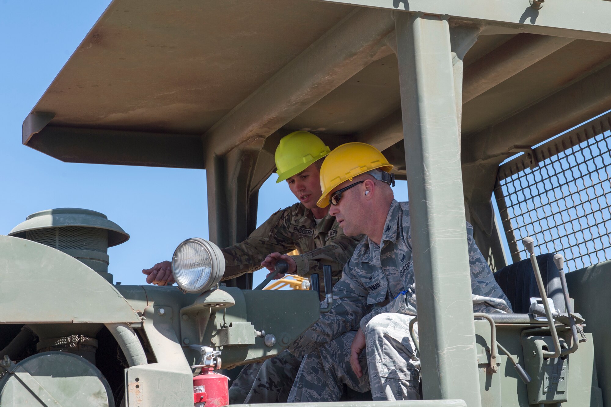 U.S. Air Force Col. Eric Newman, the vice commander of the 124th Fighter Wing, Idaho Air National Guard, tests out heavy equipment during a visit with the 124 FW Civil Engineer Squadron at the Shoshone-Paiute Tribe Aug. 26, 2019. The 128 FW CES was participating in joint-force Innovative Readiness Training where they helped to repair and build new roads for the Shoshone-Paiute Reservation. (U.S. Air National Guard photo by Senior Airman Mercedee Wilds)