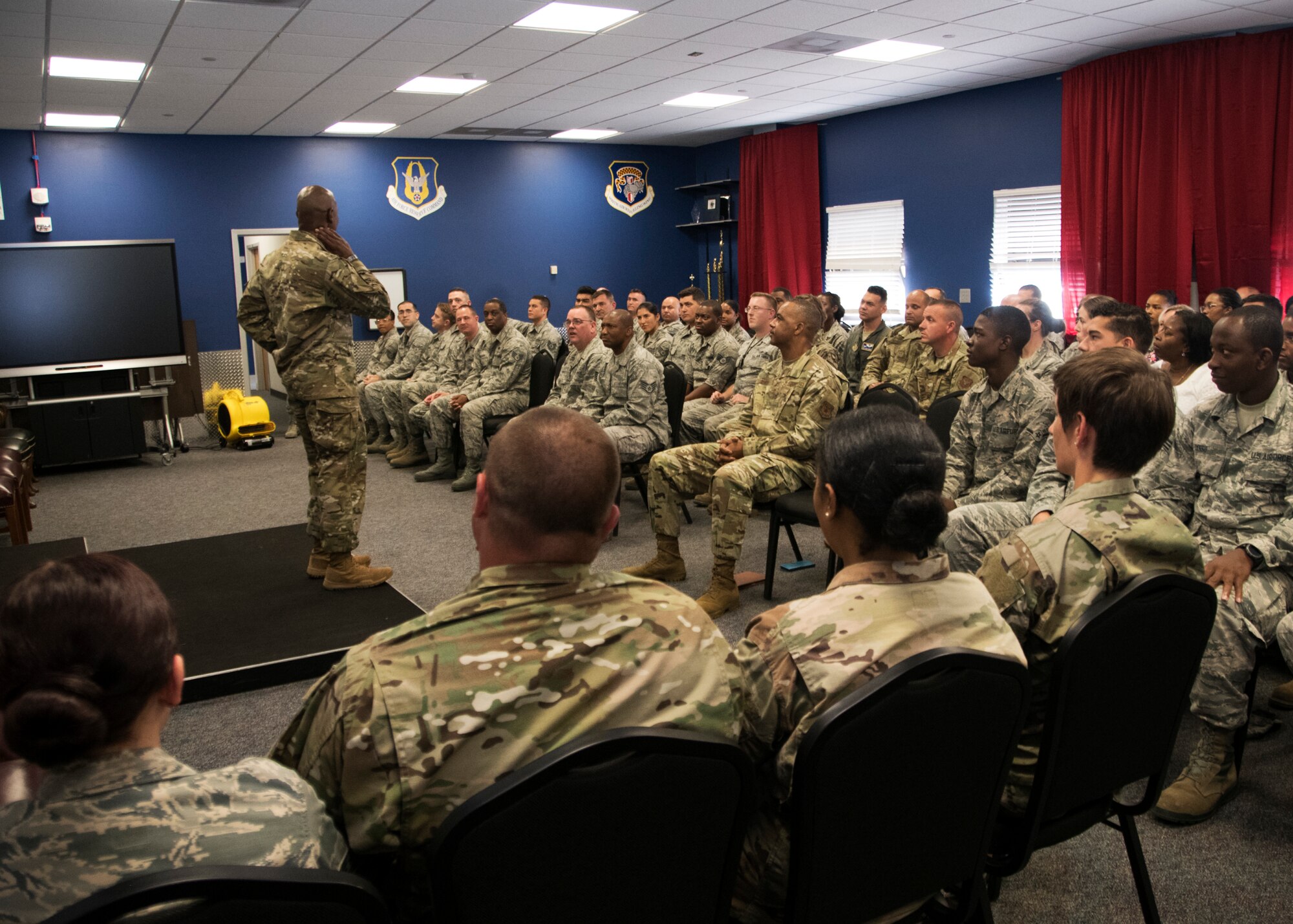 Chief Master Sergeant of the Air Force Kaleth O. Wright briefs members of the 459th Air Refueling Wing during an all-call Aug. 12, 2019, at Joint Base Andrews, Md. During his visit, Wright was shown a KC-135 Stratotanker by members of the 459th Aircraft Maintenance prior to holding an all call where he addressed issues happening in today’s Air Force. (U.S. Air Force photo by Staff Sgt. Cierra Presentado/Released)