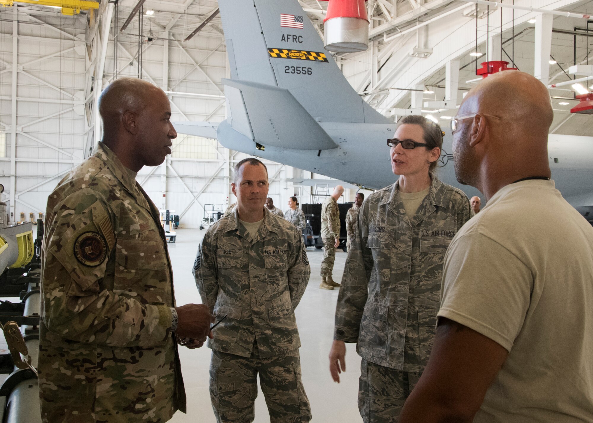 Chief Master Sergeant of the Air Force Kaleth O. Wright speaks with members of the 459th Maintenance Group during a visit to the wing Aug. 12, 2019, at Joint Base Andrews, Md. During his visit, Wright was shown a KC-135 Stratotanker by members of the 459th Aircraft Maintenance prior to holding an all call where he addressed issues happening in today’s Air Force. (U.S. Air Force photo by Staff Sgt. Cierra Presentado/Released)
